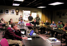 A typical daily all-hands staff briefing.
